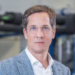 Dr. oec. Christian Hennerkes. - Von Roll Geschäftsleitung