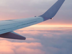 Aerospace Von Roll - Airplane flying towards the sunset