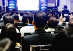 Employees listening to a presentation